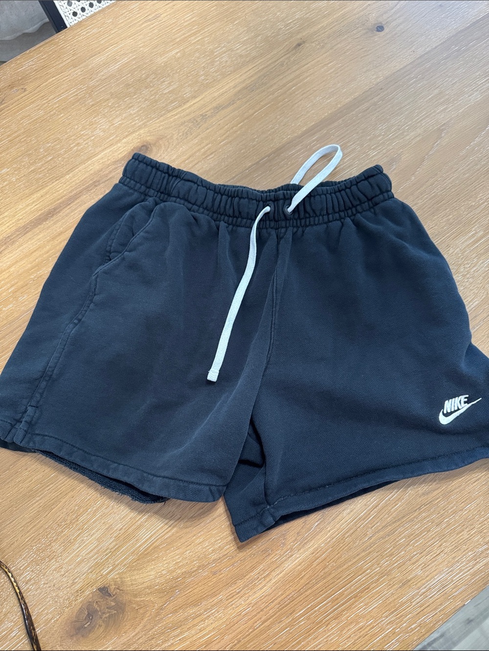 Nike Black Shorts with White Drawstring and Swoosh